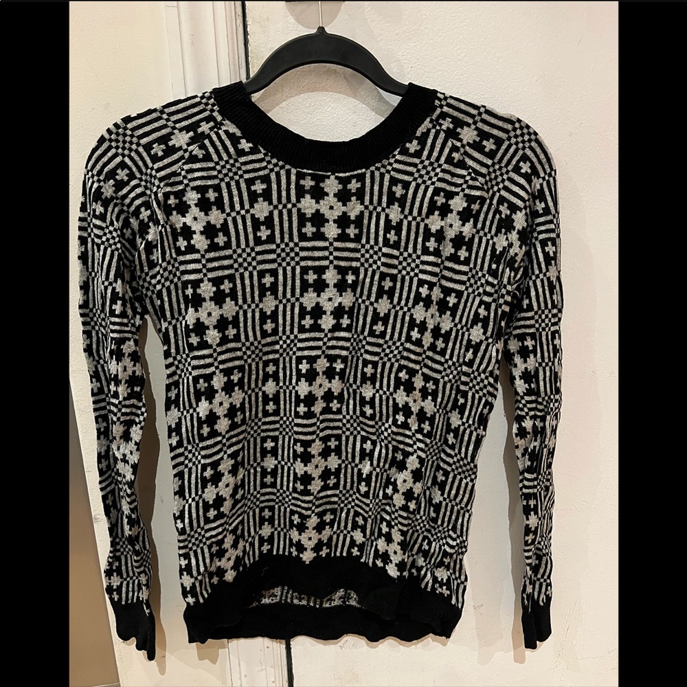 Joie sweater with geometric/Aztec design in black and white.